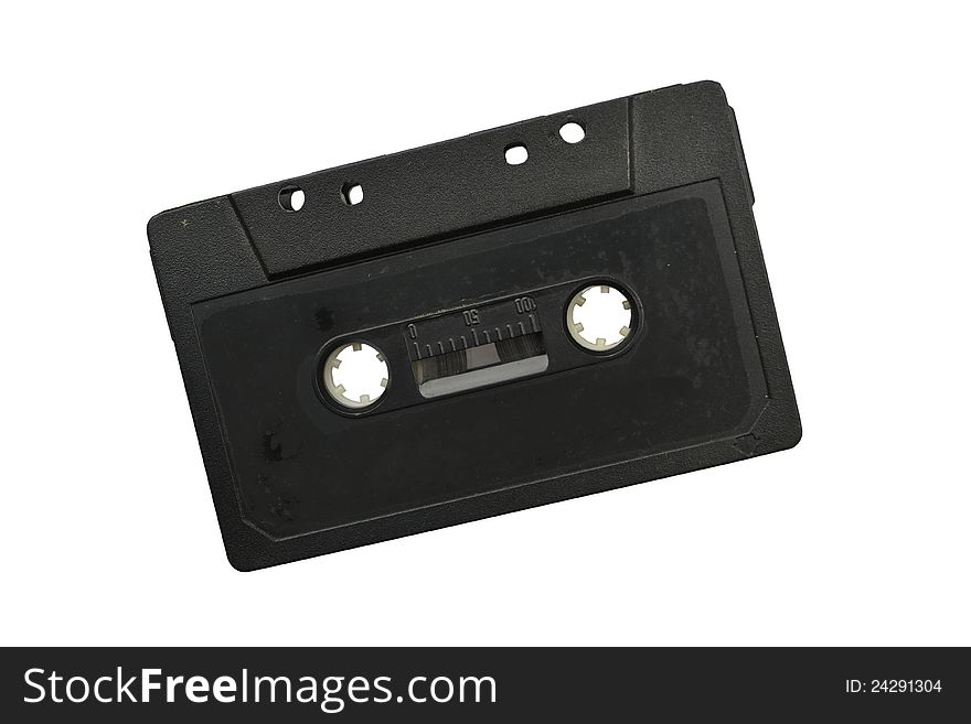 Black audio cassette on a white background. Black audio cassette on a white background