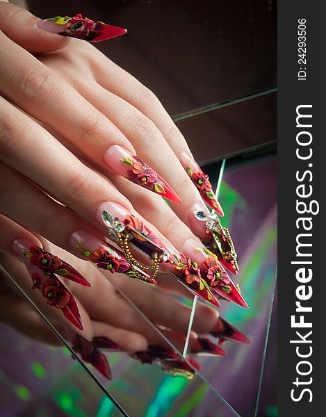 Beautiful manicure of nails, with a specular reflection. Beautiful manicure of nails, with a specular reflection
