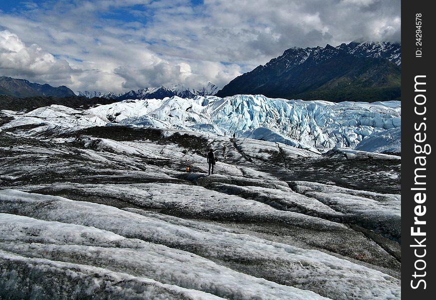 People walking on ice of Matanuska glacier, Alaska. People walking on ice of Matanuska glacier, Alaska