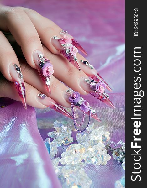 Beautiful manicure of nails, with a specular reflection. Beautiful manicure of nails, with a specular reflection