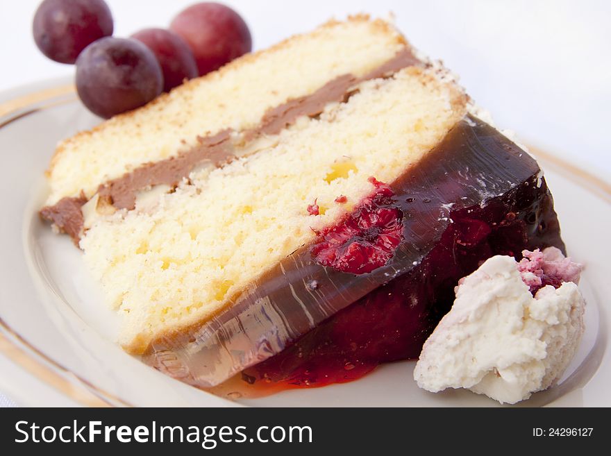 Cake with raspberry jelly. In the middle of the chocolate mass.