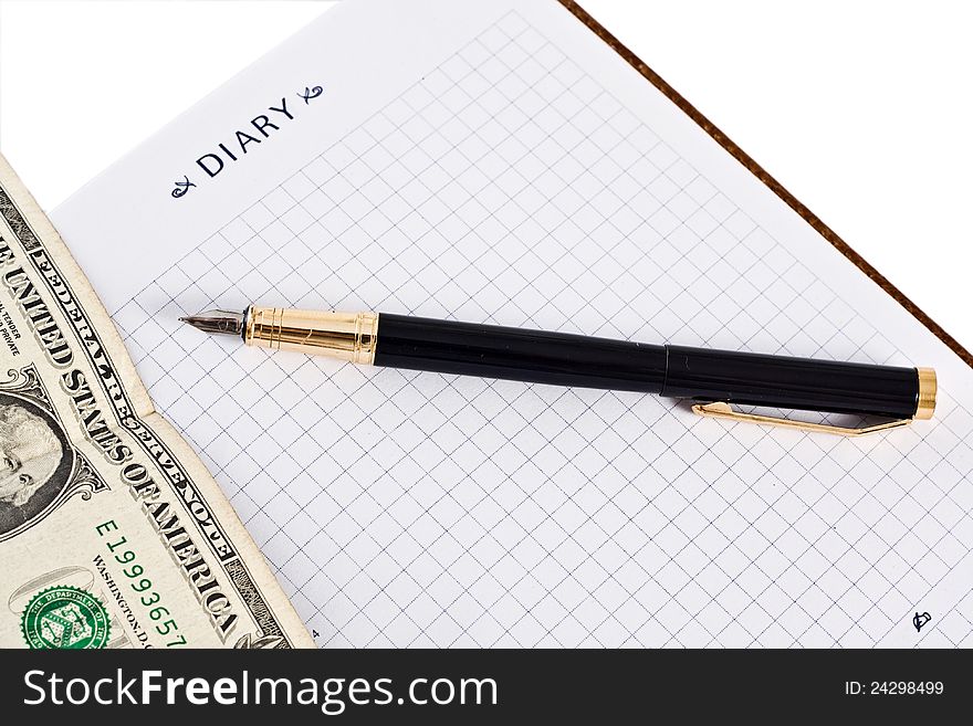 Diary with money and pen isolated on white background. Diary with money and pen isolated on white background