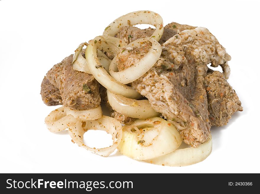 Marinated meat of porc with onion and spice. Marinated meat of porc with onion and spice