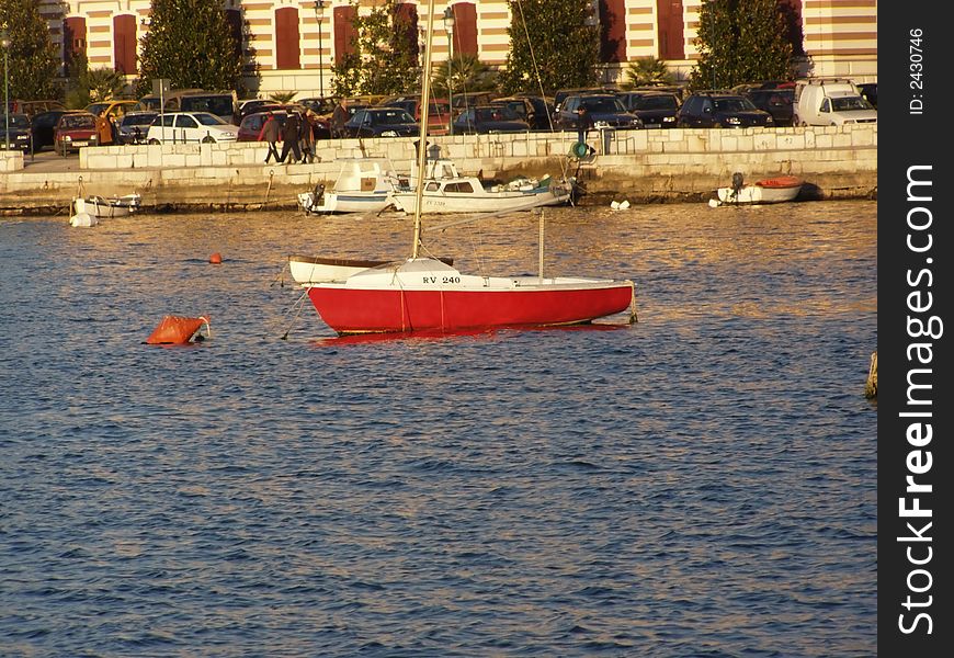 Red Sailing Boat In The Port