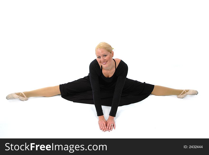 Ballerina wearing black on a white background