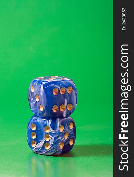 Two blue dices on green