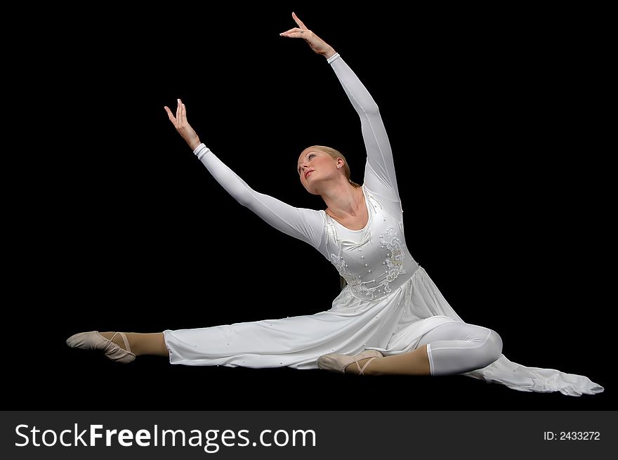 Ballerina wearing white on a black background