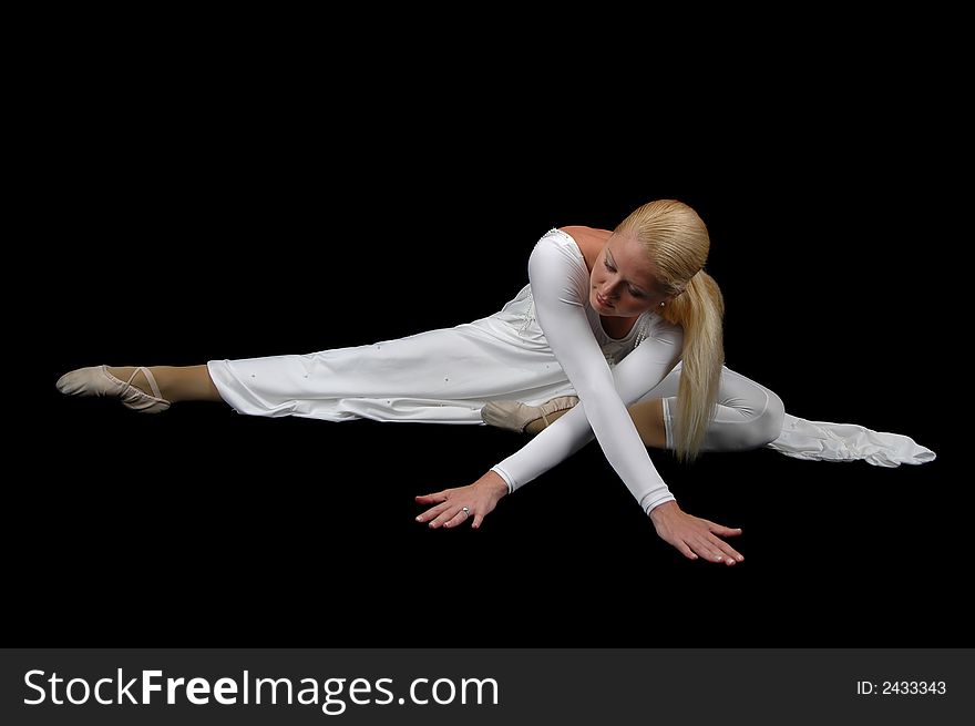 Ballerina wearing white on a black background