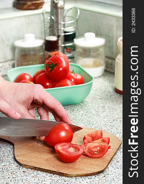 Preparing salad in the kitchen. Preparing salad in the kitchen