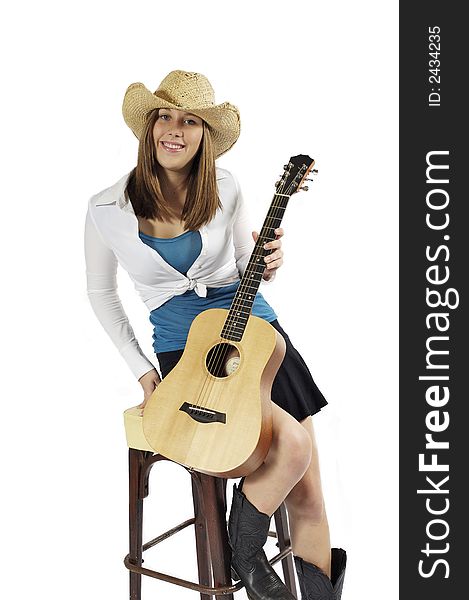 Young brunette with guitar ready for playing. Young brunette with guitar ready for playing