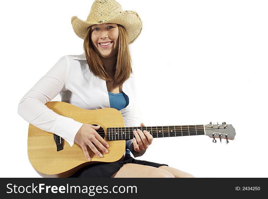 Young brunette with guitar ready for playing. Young brunette with guitar ready for playing