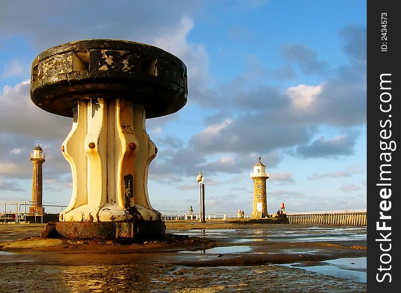 Close-up view of old capstan on Whitby pier. Taken in afternoon sunlight.