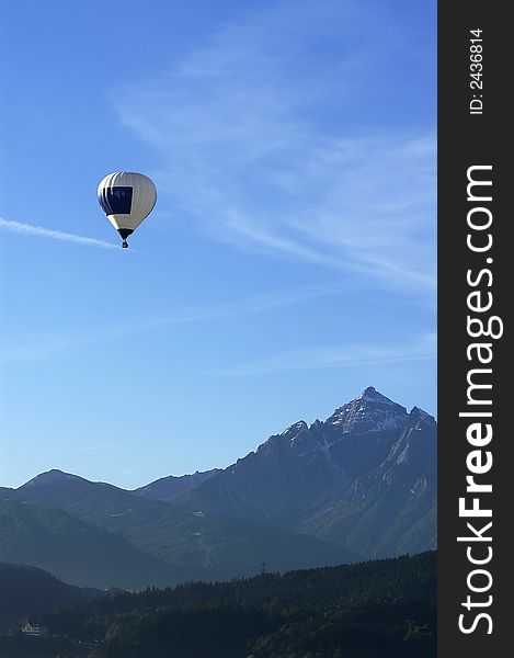 A balloon above mountains in the Alps. A balloon above mountains in the Alps