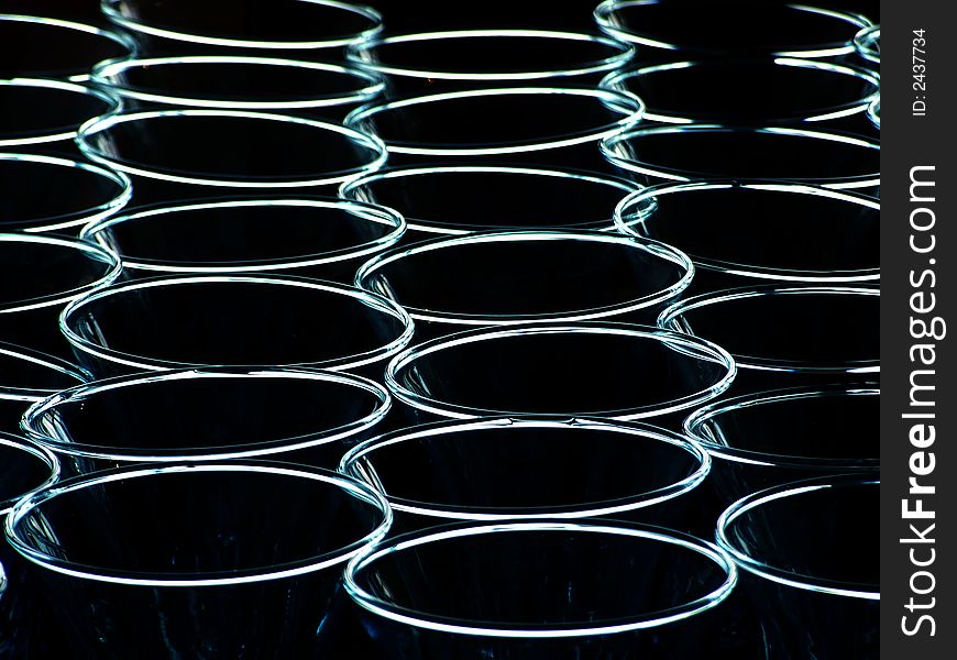 Light in circles reflecting of the top of glasses. Light in circles reflecting of the top of glasses
