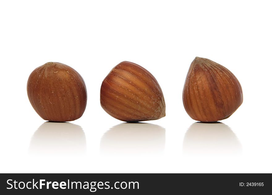 Hazelnuts isolated over white background