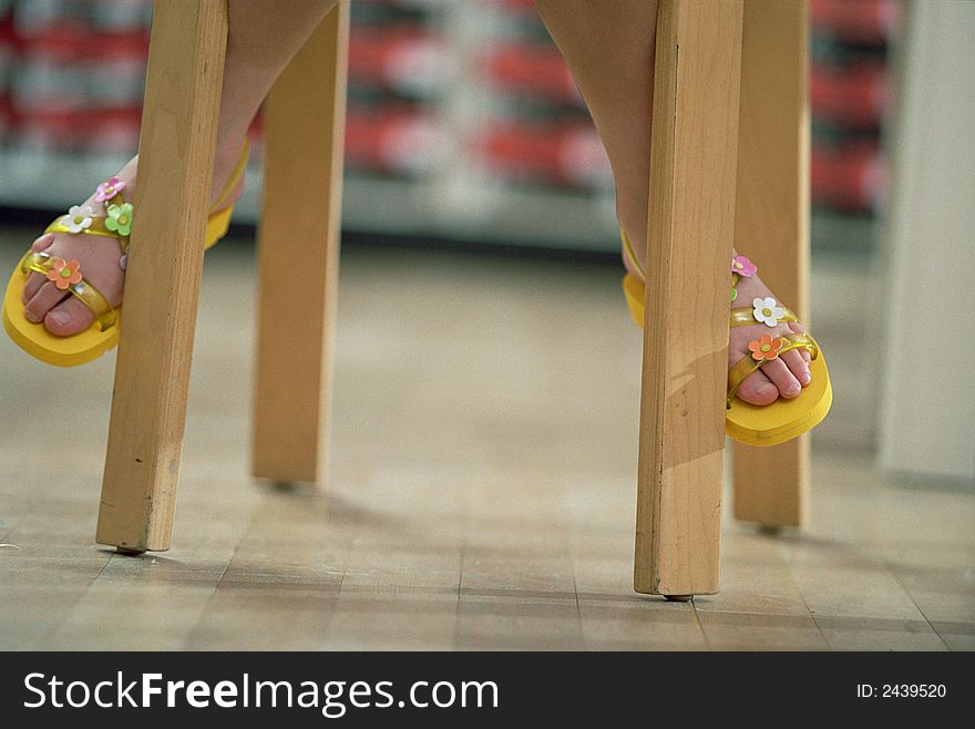 A little girl's yellow shoes. A little girl's yellow shoes