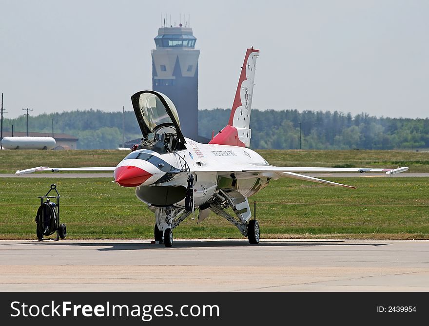 A fighter performed at a air show. A fighter performed at a air show