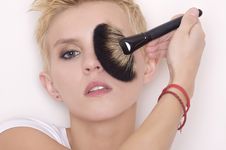 Make-up Artist Holding Brushes Stock Photos