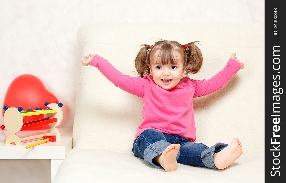 Little Girl Playing With Toys