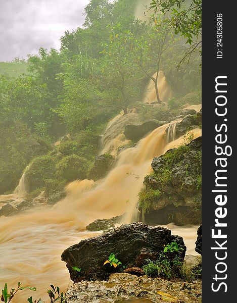 Muddy stream of a waterfall in Java, just after the rain. Muddy stream of a waterfall in Java, just after the rain