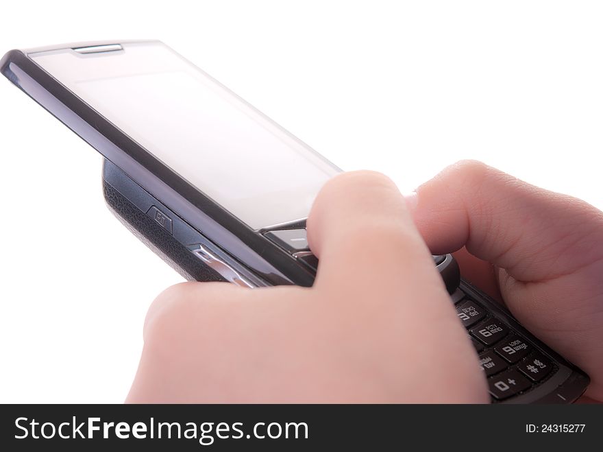 A mobile telephone is in child's hands isolated on white. A mobile telephone is in child's hands isolated on white.