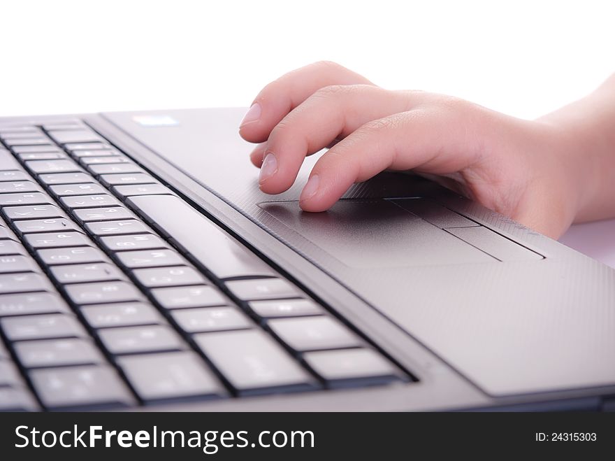 Child's hands on the keyboard of notebook. Child's hands on the keyboard of notebook