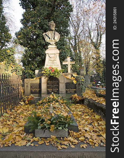 Grave covered with yellow leaves. Grave covered with yellow leaves