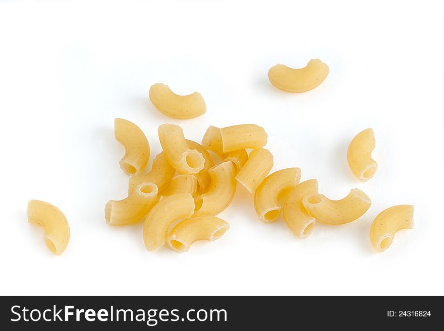 Closeup of a yellow macaroni on a white background