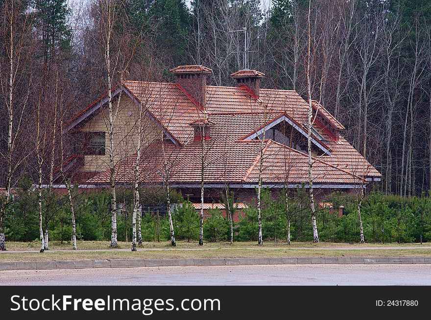 Posh big house in forest alone with trees. Posh big house in forest alone with trees