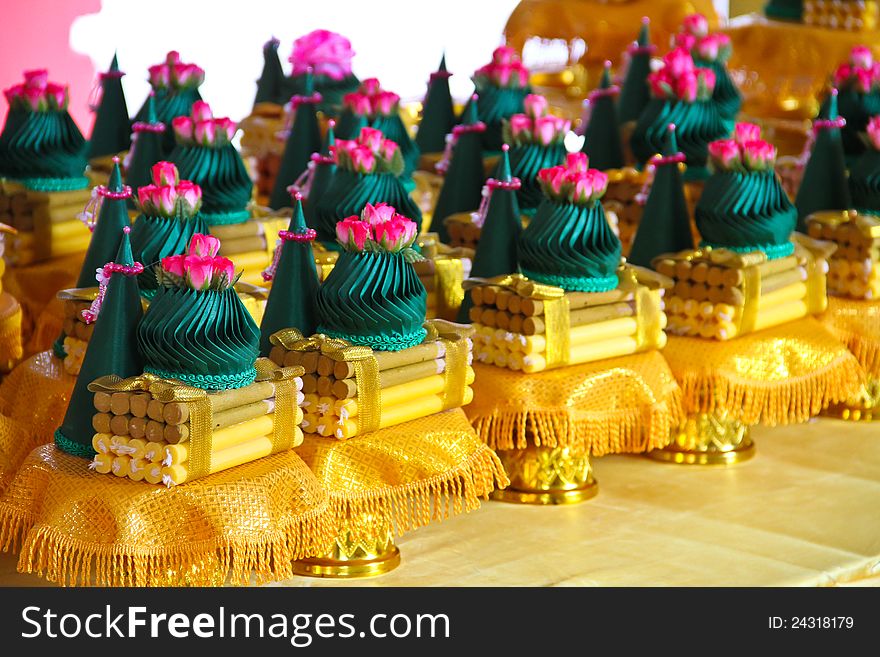 Cone flowers, incense, candles in temple