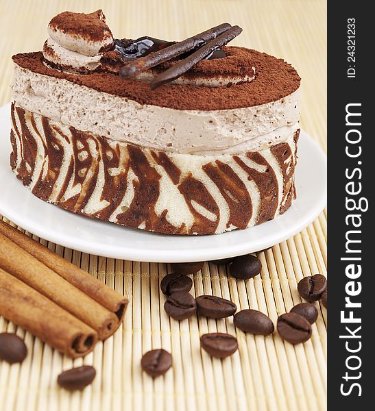Chocolate Cake, coffee beans and cinnamon sticks