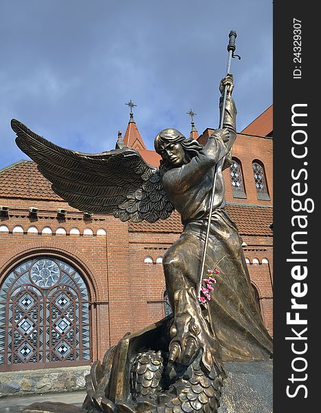 Statue of St Michael near Catholic chapel St Simon and St Helena also called as Red Church in Minsk. Statue of St Michael near Catholic chapel St Simon and St Helena also called as Red Church in Minsk