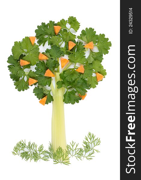 Tree of parsley and celery stalks with a lawn grass and fruit