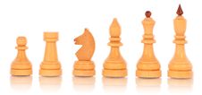 Chess. A Group Of White Wooden Chess Pieces Stock Images