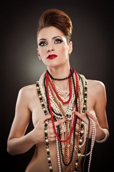 Portrait Of Beautiful Woman With Many Beads Royalty Free Stock Photos