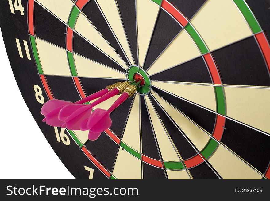 Three darts hitting a target on circular dart board. Three darts hitting a target on circular dart board