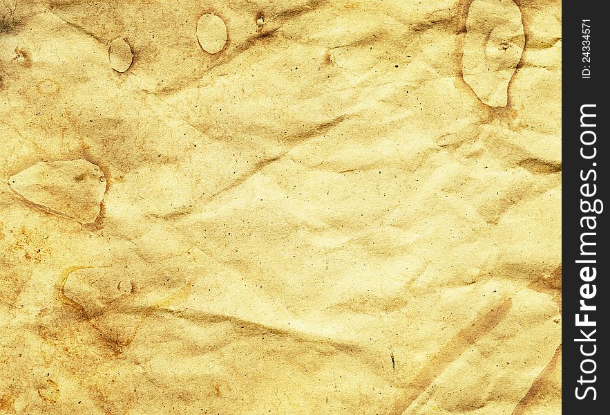 Crumpled brown aged paper texture. Crumpled brown aged paper texture