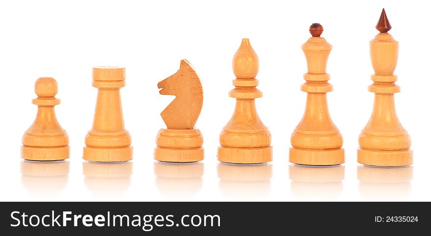 Chess. a group of white wooden chess pieces