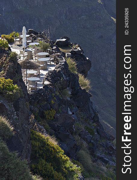 Bar by the cliff of the volcanic caldera at Santorini island in Greece. Bar by the cliff of the volcanic caldera at Santorini island in Greece