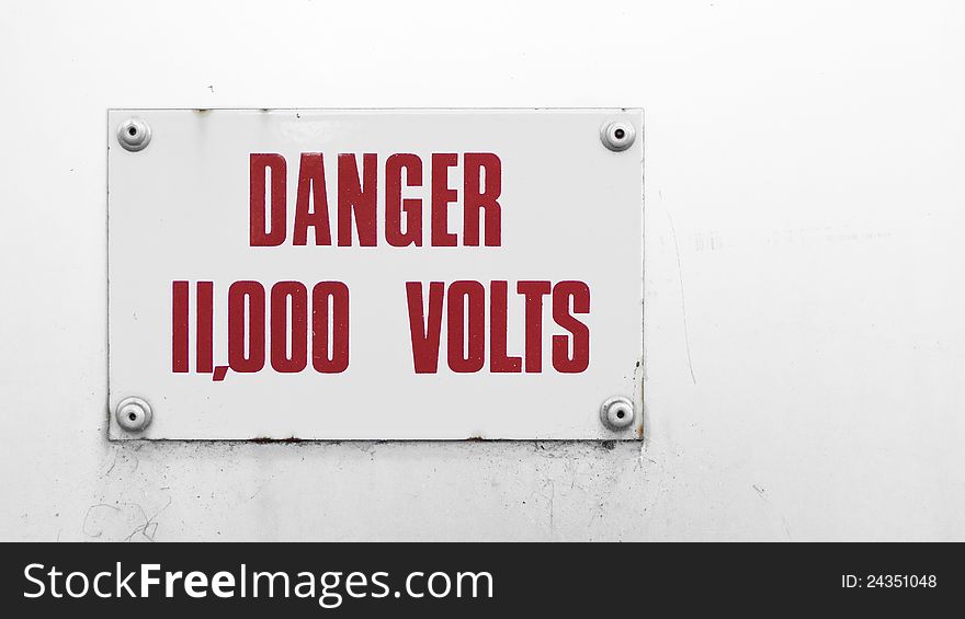 Warning sign on electrical box advertising danger. Warning sign on electrical box advertising danger.