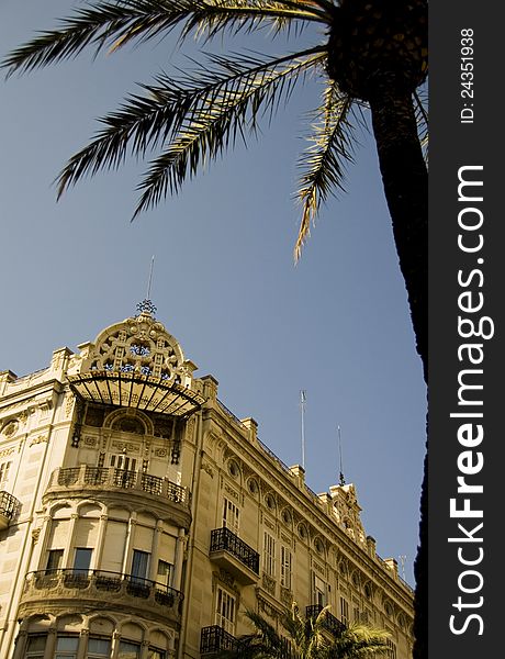 Old building under a palm tree in valencia, spain. Old building under a palm tree in valencia, spain