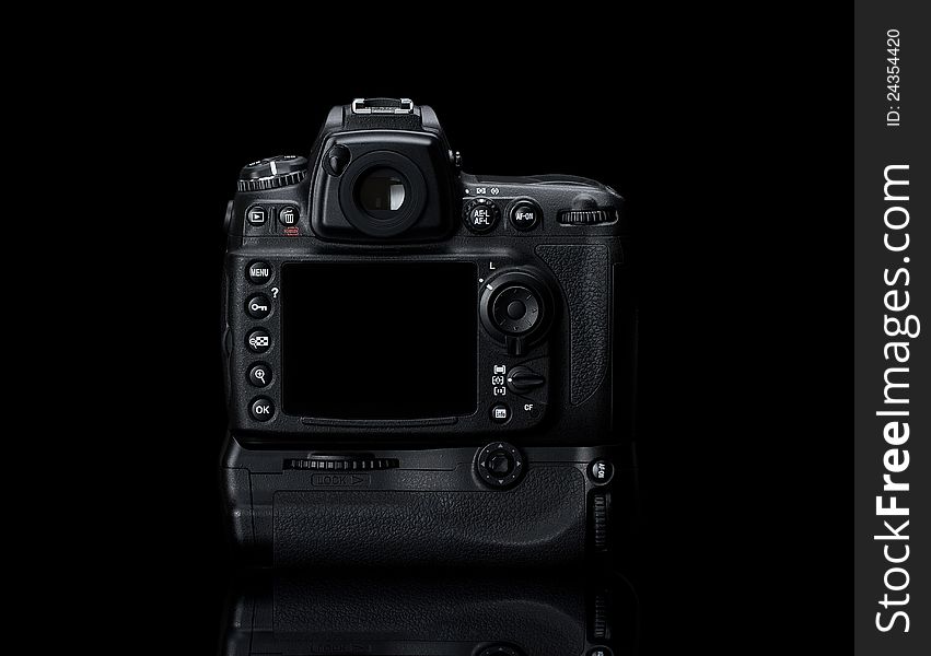 Digital SLR camera isolated on black background with clipping path for the screen