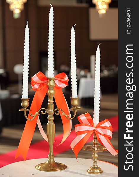 Wedding candle on table with Ribbon