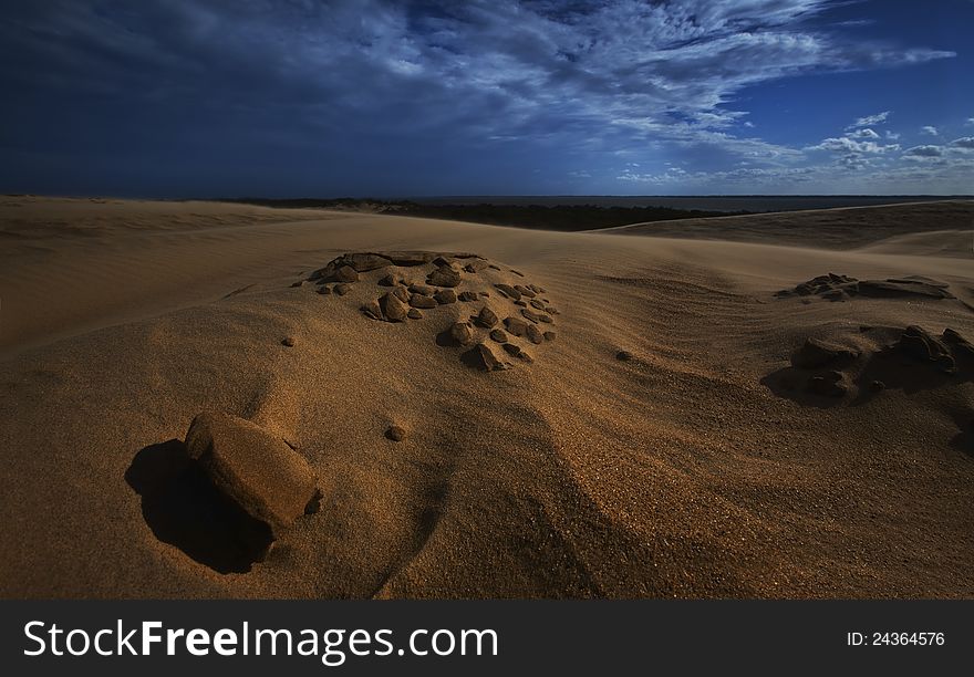 Sand dunes under full moon light
