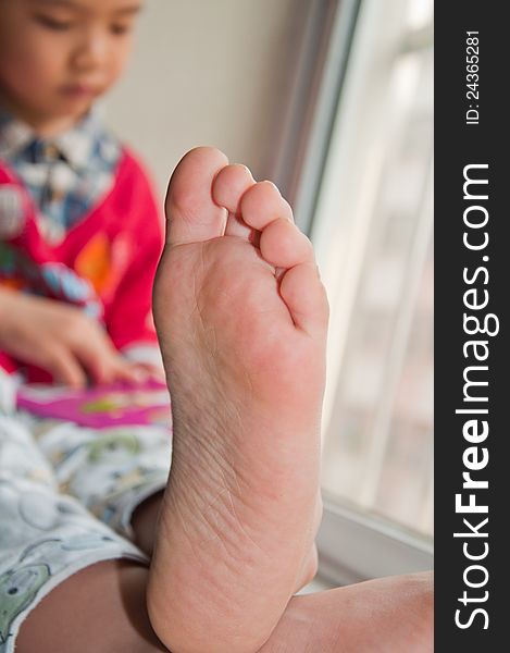 Child's foot, the identity of the local close-up. Child's foot, the identity of the local close-up.