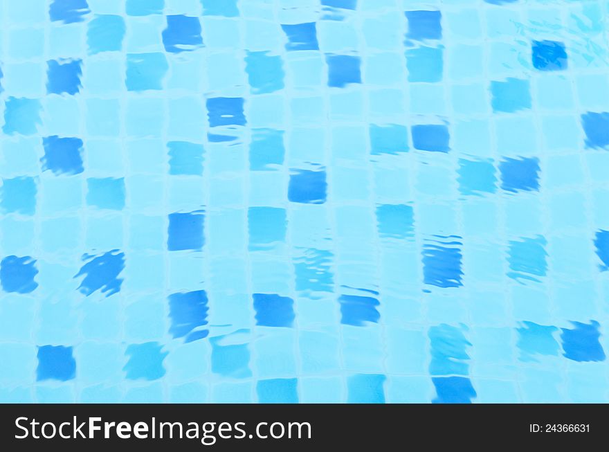 Aqua blue tile in water