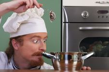 Chef Strange Looking At Pot Stock Photography Chef Strange Looking At Pot Stock Photography