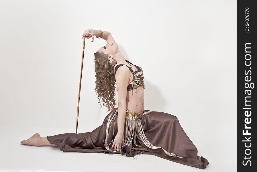 Beautiful woman in the active, arabic dance, studio shot