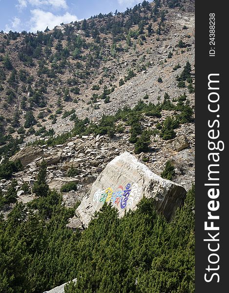 Tibetan Buddhist Mani Stone � stone with mantras in Himalaya mountains