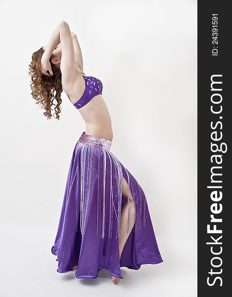 Beautiful woman in the active, arabic dance, studio shot